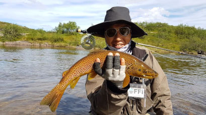 Masahiko Arai with golden dorado